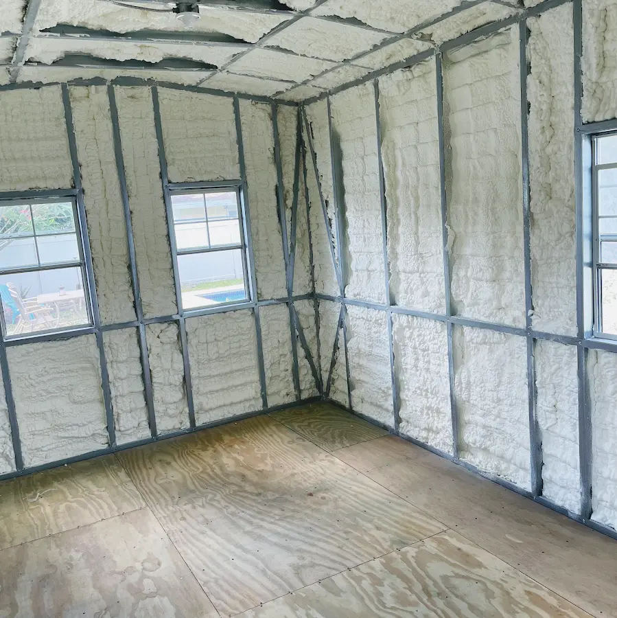 Closed-cell spray foam insulation applied to wall cavities in a residential project in Tacoma